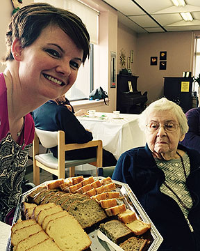 Dawson Court resident <strong>Etta Findlay</strong> (right) tries to decide what kind of bread to sample from St. Joseph's Care Group's Life Enrichment Coordinator <strong>Jessica Venasky</strong> (left)