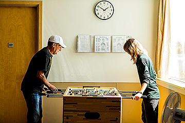 Taking time for yourself - two people playing Fooseball
